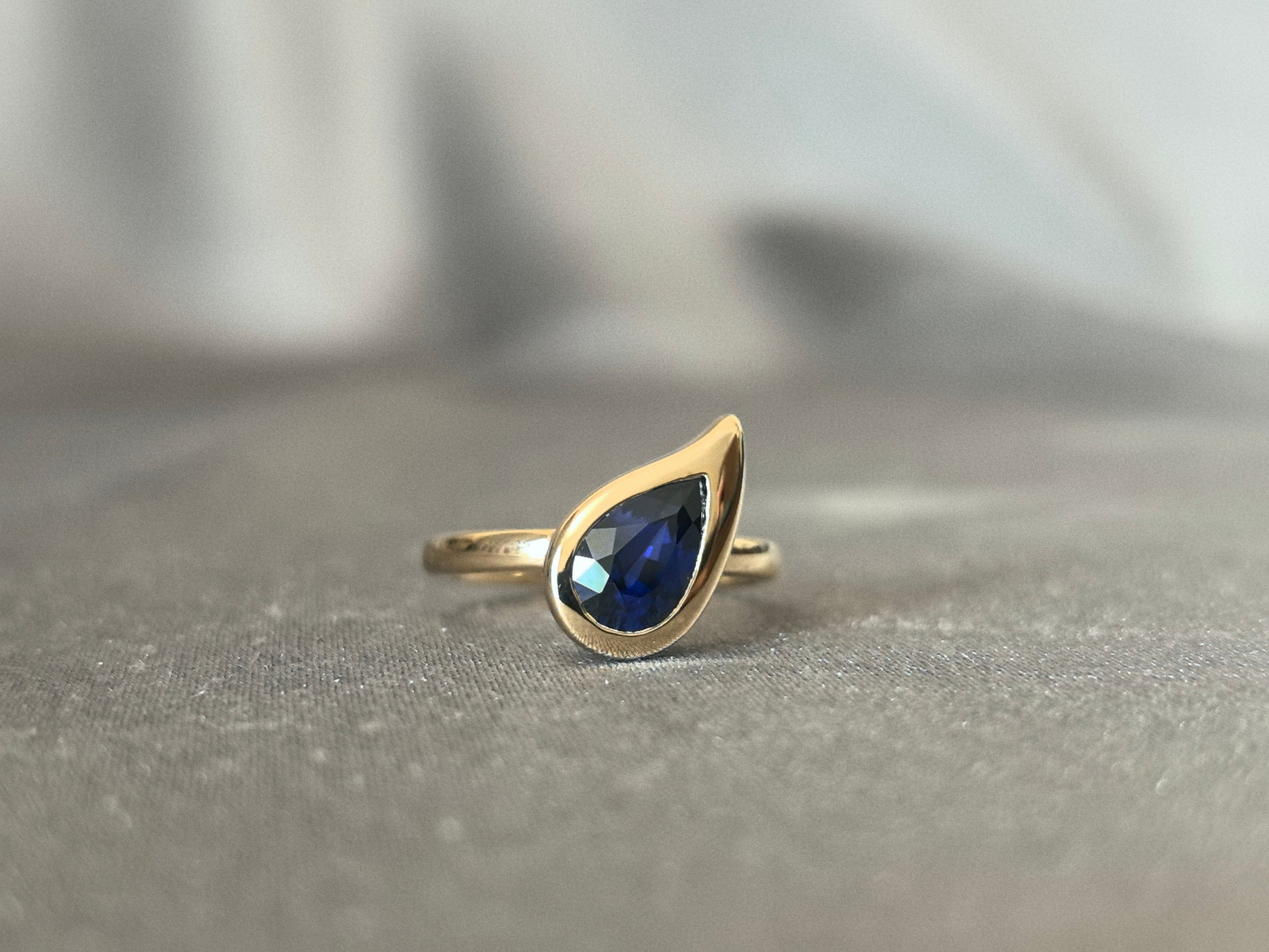 Pear-shaped Lab-Grown Diamond Pinky Ring - Blue Gemstone - Full Halo Setting