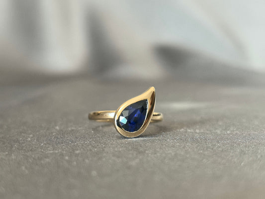 Pear-shaped Lab-Grown Diamond Pinky Ring - Blue Gemstone - Full Halo Setting