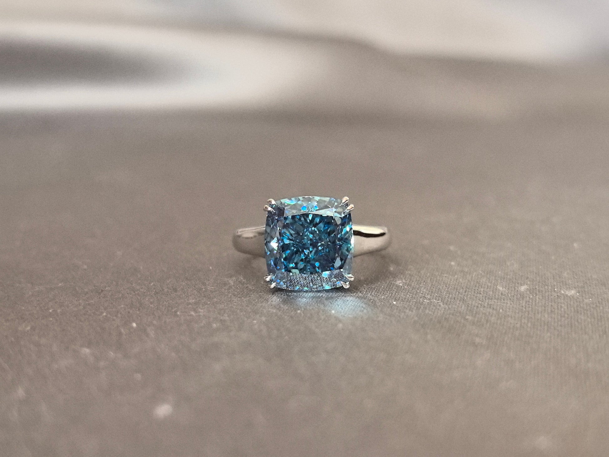 Blue Cushion Shape Diamond - Four Prong Setting - Round Shank