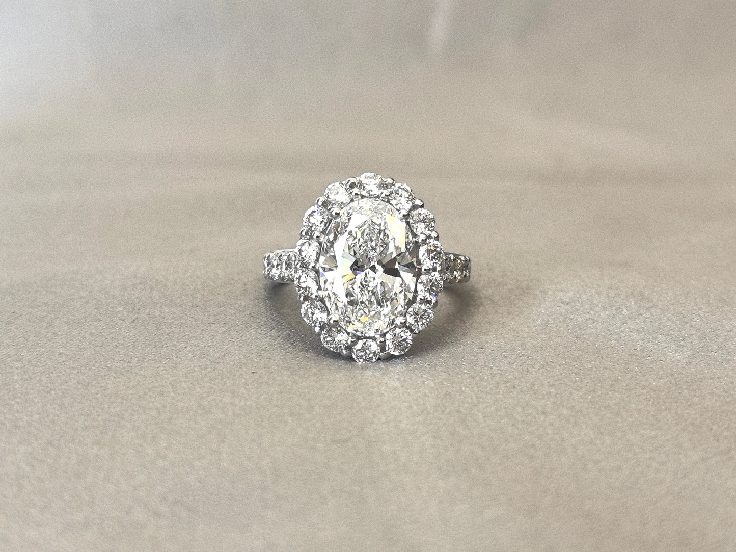 Iconic Oval Halo Ring - Half-Eternity Band - Maximum Brilliance