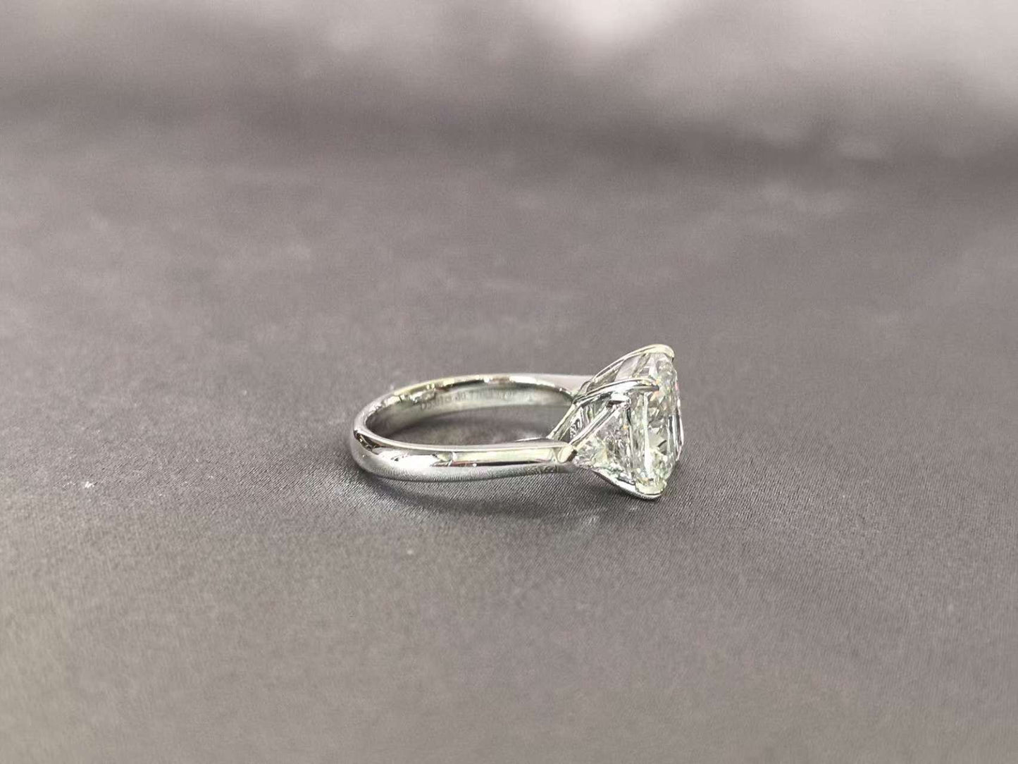 Cushion-Center Trilogy Ring with Trillion-Cut Sidestones