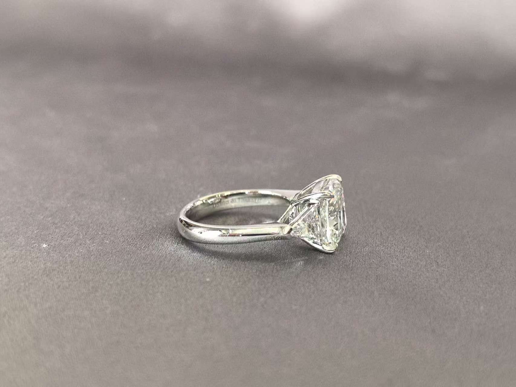 Cushion-Center Trilogy Ring with Trillion-Cut Sidestones