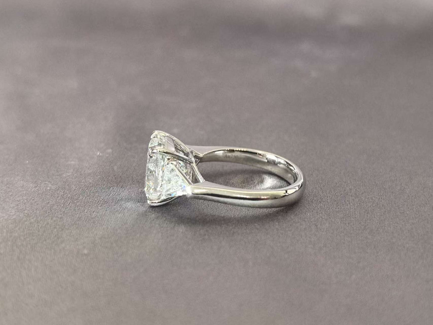 Cushion-Center Trilogy Ring with Trillion-Cut Sidestones
