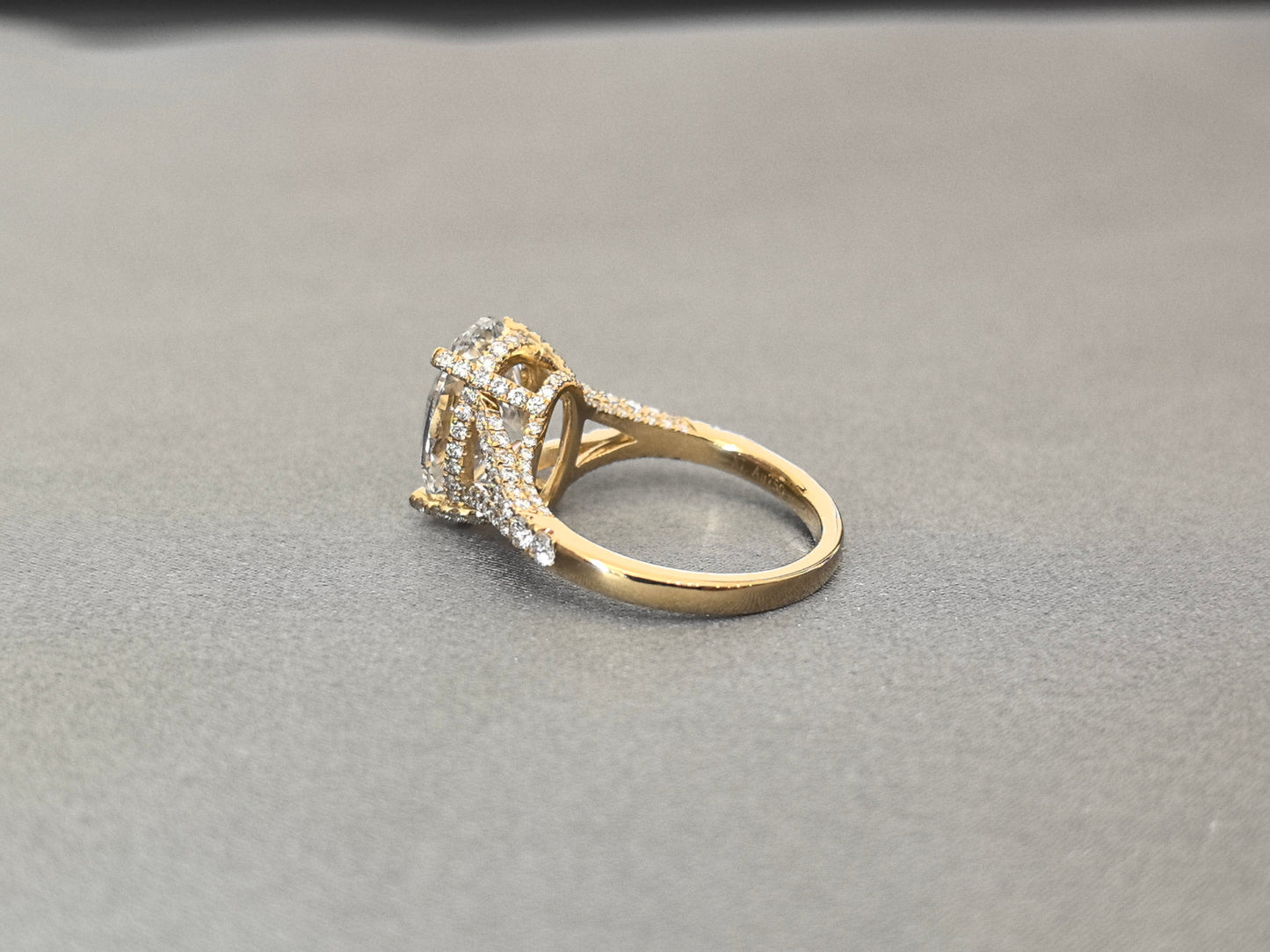 Oval Cut Four-Prong Solitaire - Pave Set Diamond Shank - Hidden Halo & Half Pavé Band