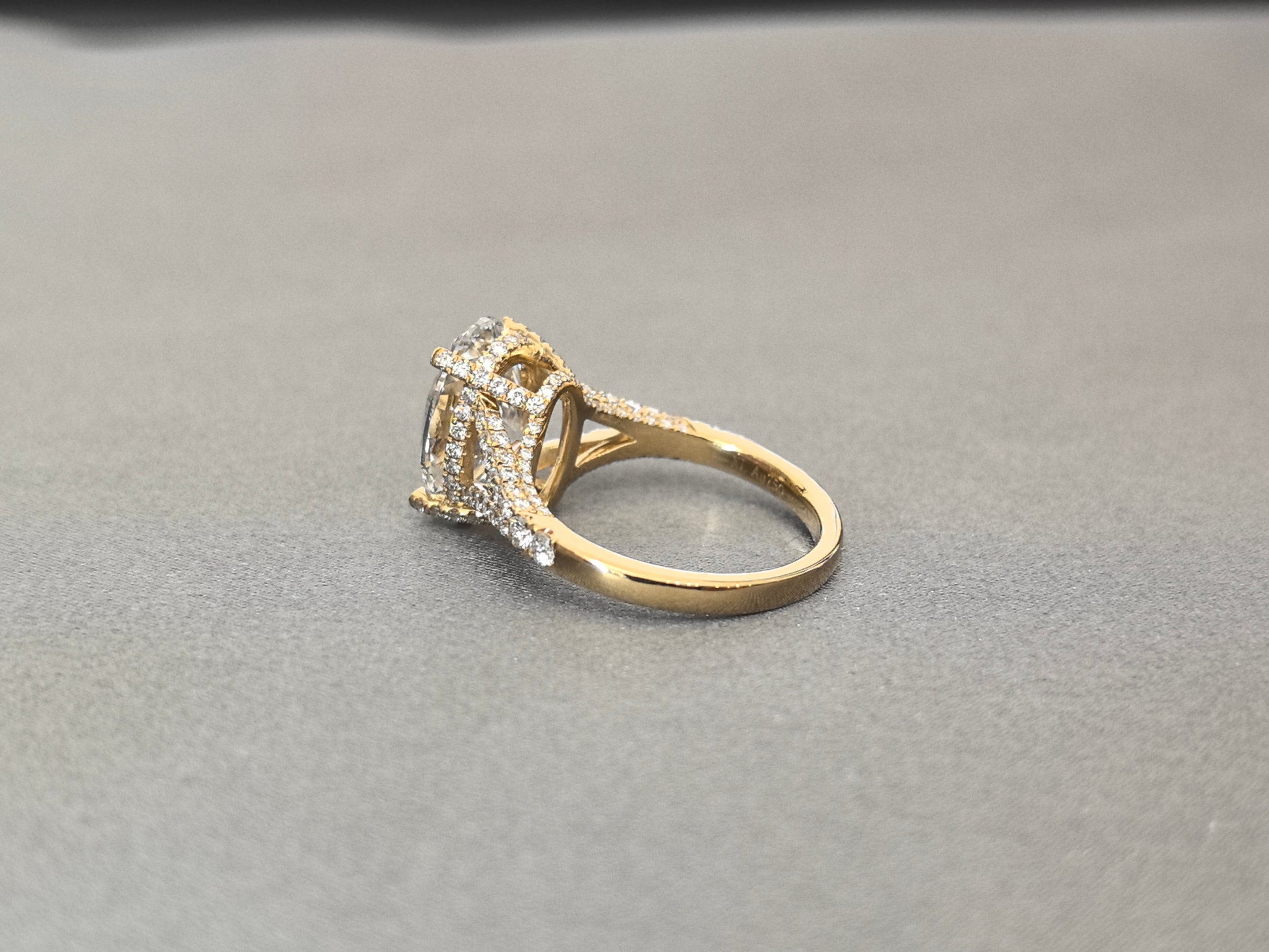 Oval Cut Four-Prong Solitaire - Pave Set Diamond Shank - Hidden Halo & Half Pavé Band