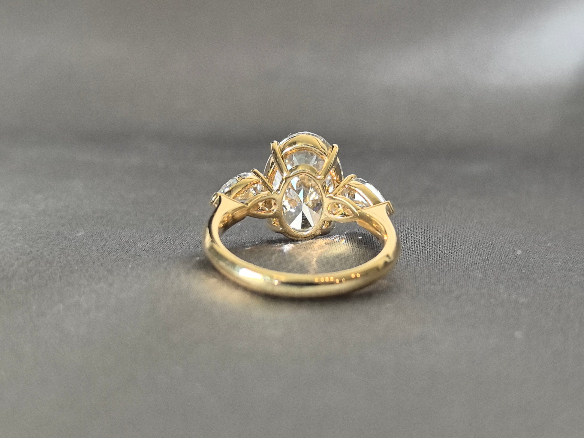 Oval Center Trilogy Ring - Pear Sidestones - Fluid Elegance