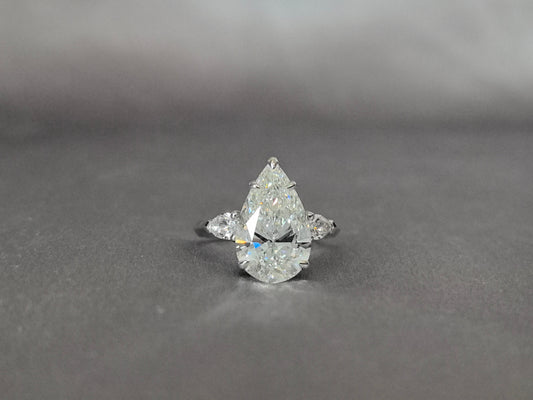 Pear-Center Trilogy Ring - Pear Sidestones - Fluid Harmony