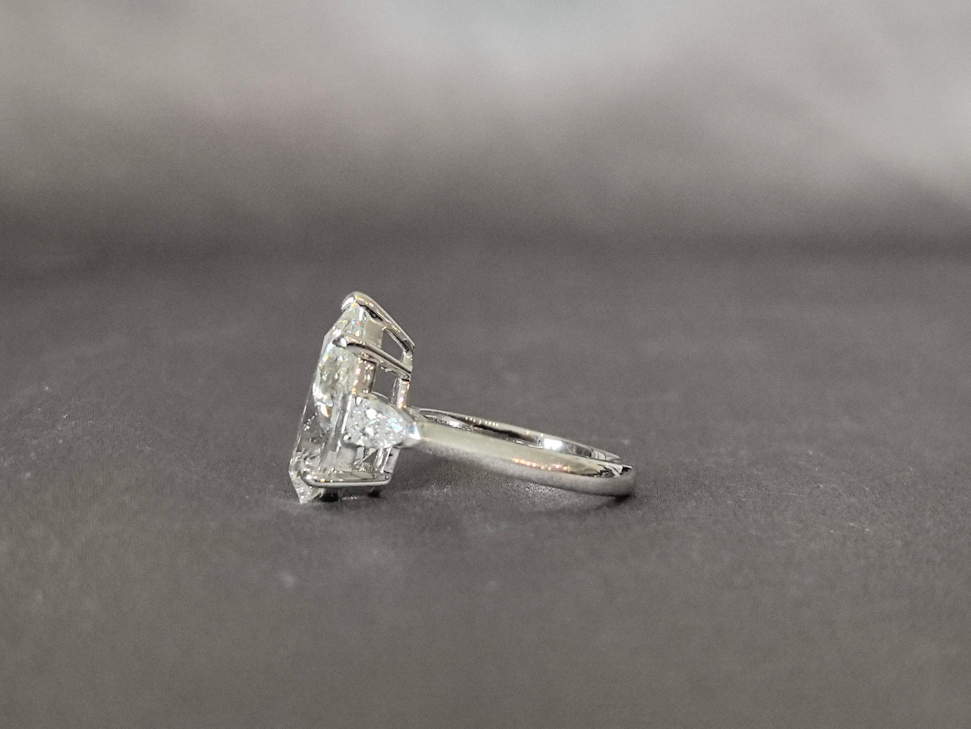 Pear-Center Trilogy Ring - Pear Sidestones - Fluid Harmony