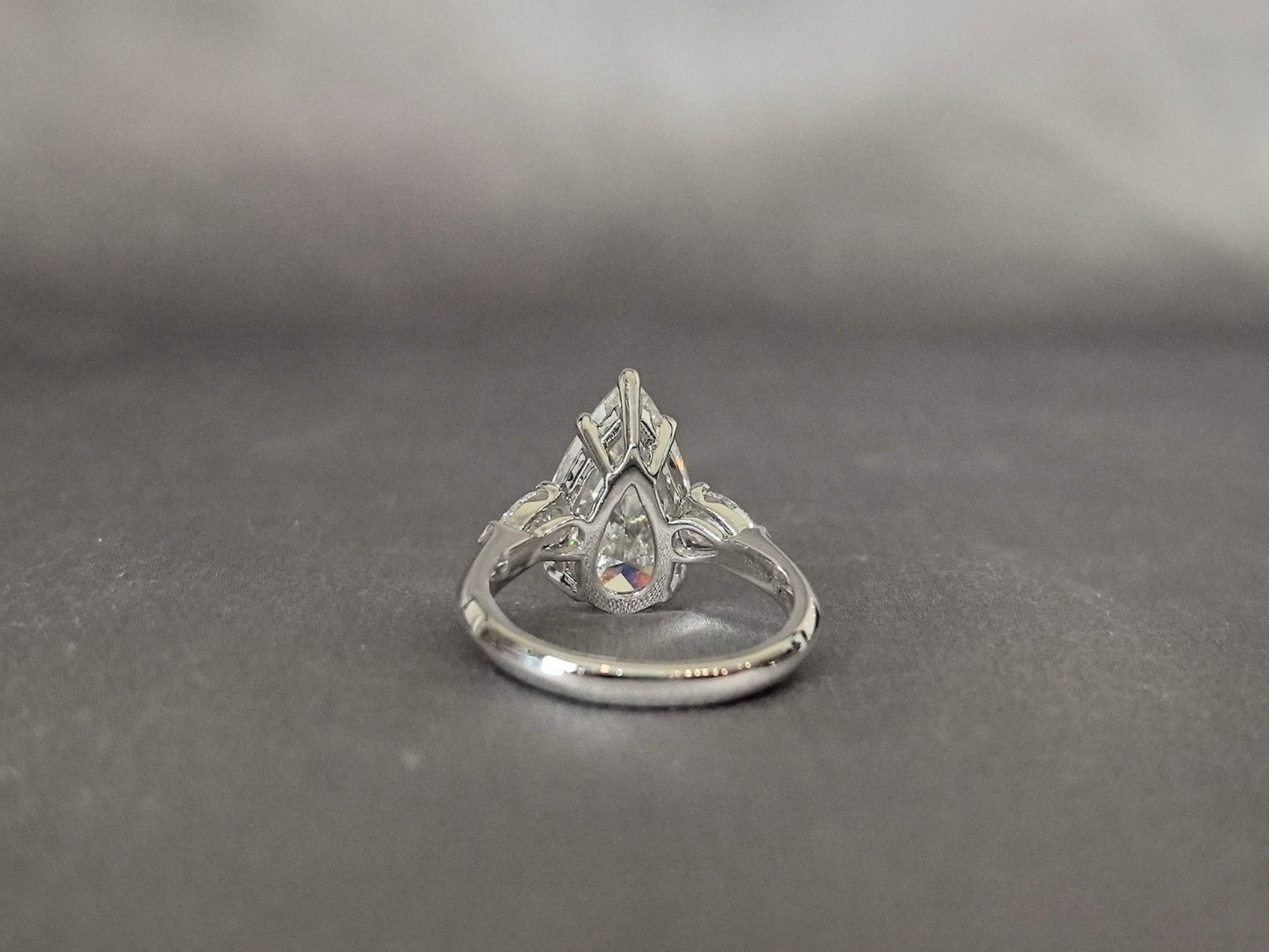 Pear-Center Trilogy Ring - Pear Sidestones - Fluid Harmony