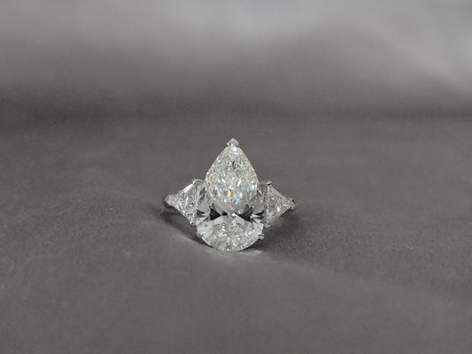 Pear-Center Trilogy Ring - Trillion-Cut Sidestones - Fluid Geometry