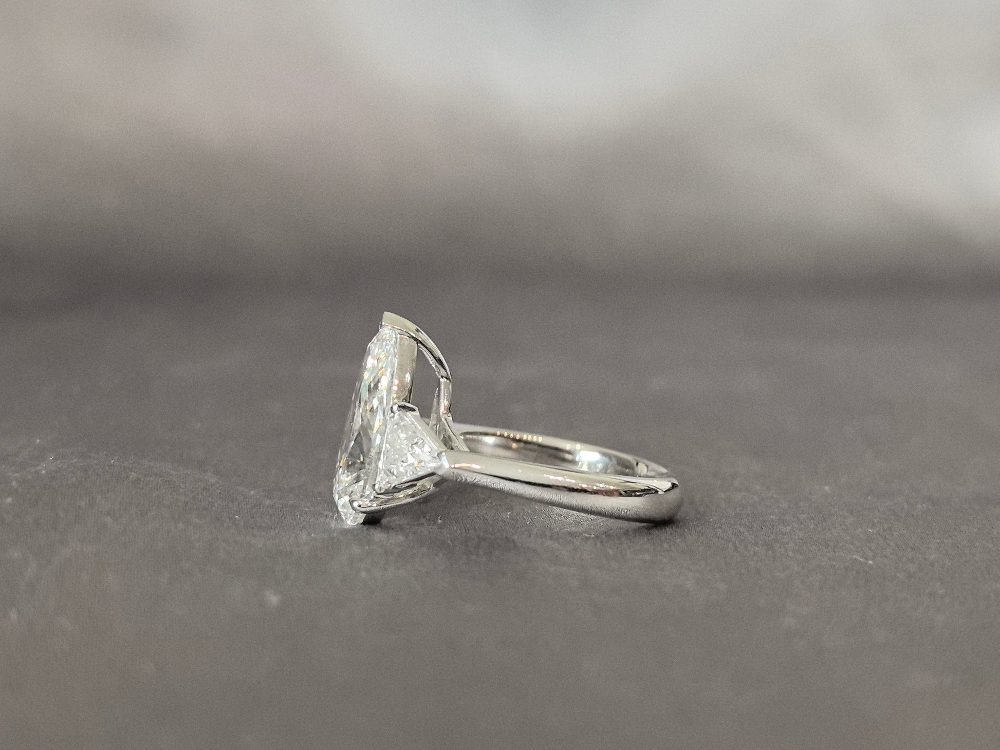 Pear-Center Trilogy Ring - Trillion-Cut Sidestones - Fluid Geometry