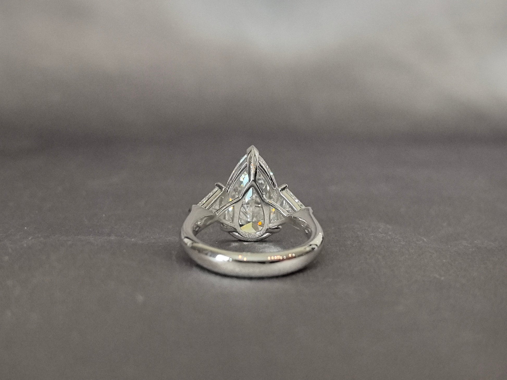 Pear-Center Trilogy Ring - Trillion-Cut Sidestones - Fluid Geometry