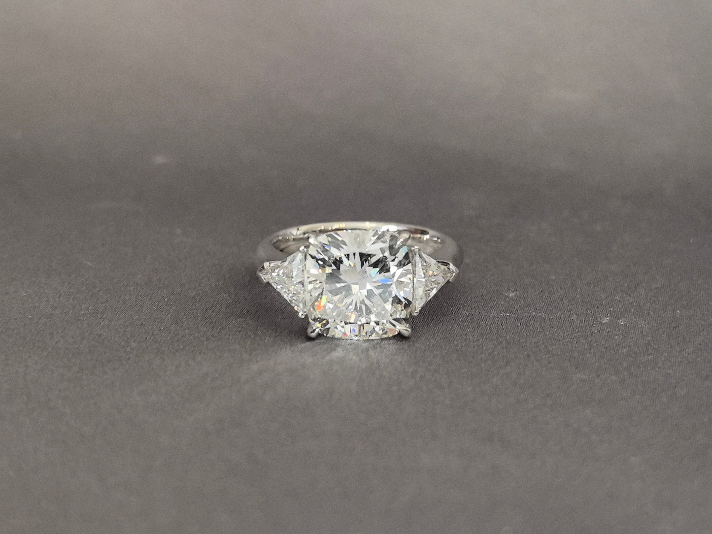 Cushion-Center Trilogy Ring with Trillion-Cut Sidestones