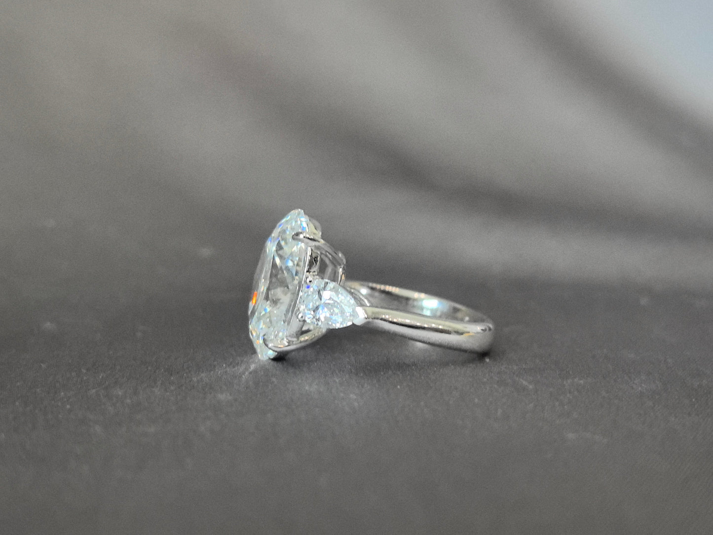 Oval-Center Trilogy Ring - Pear Sidestones - Classic Timeless