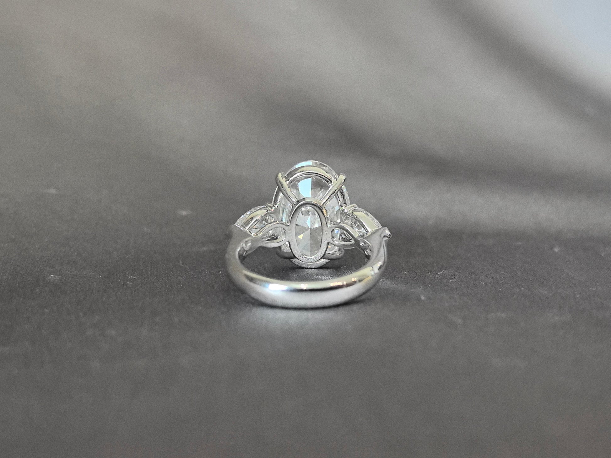 Oval-Center Trilogy Ring - Pear Sidestones - Classic Timeless