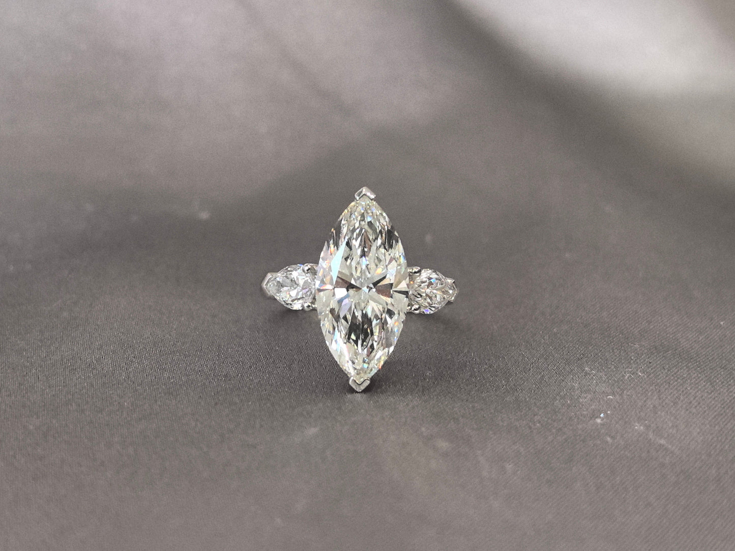 Marquise-Center Trilogy Ring - Pear Sidestones - Dynamic Elegance