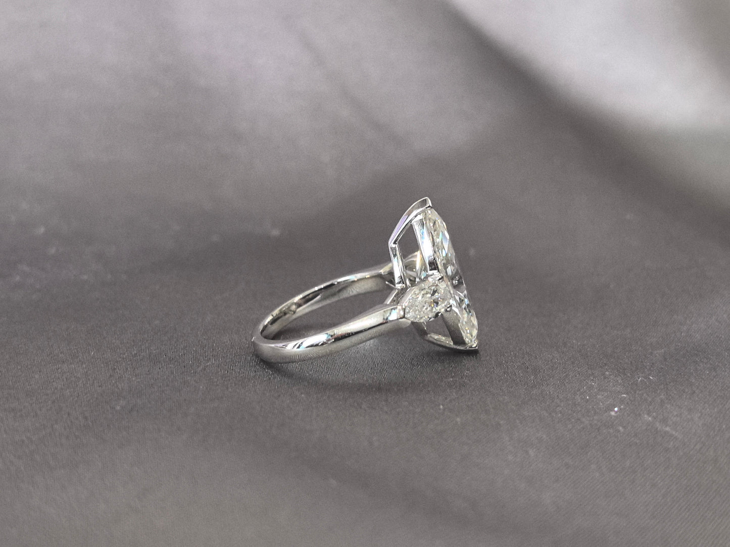 Marquise-Center Trilogy Ring - Pear Sidestones - Dynamic Elegance