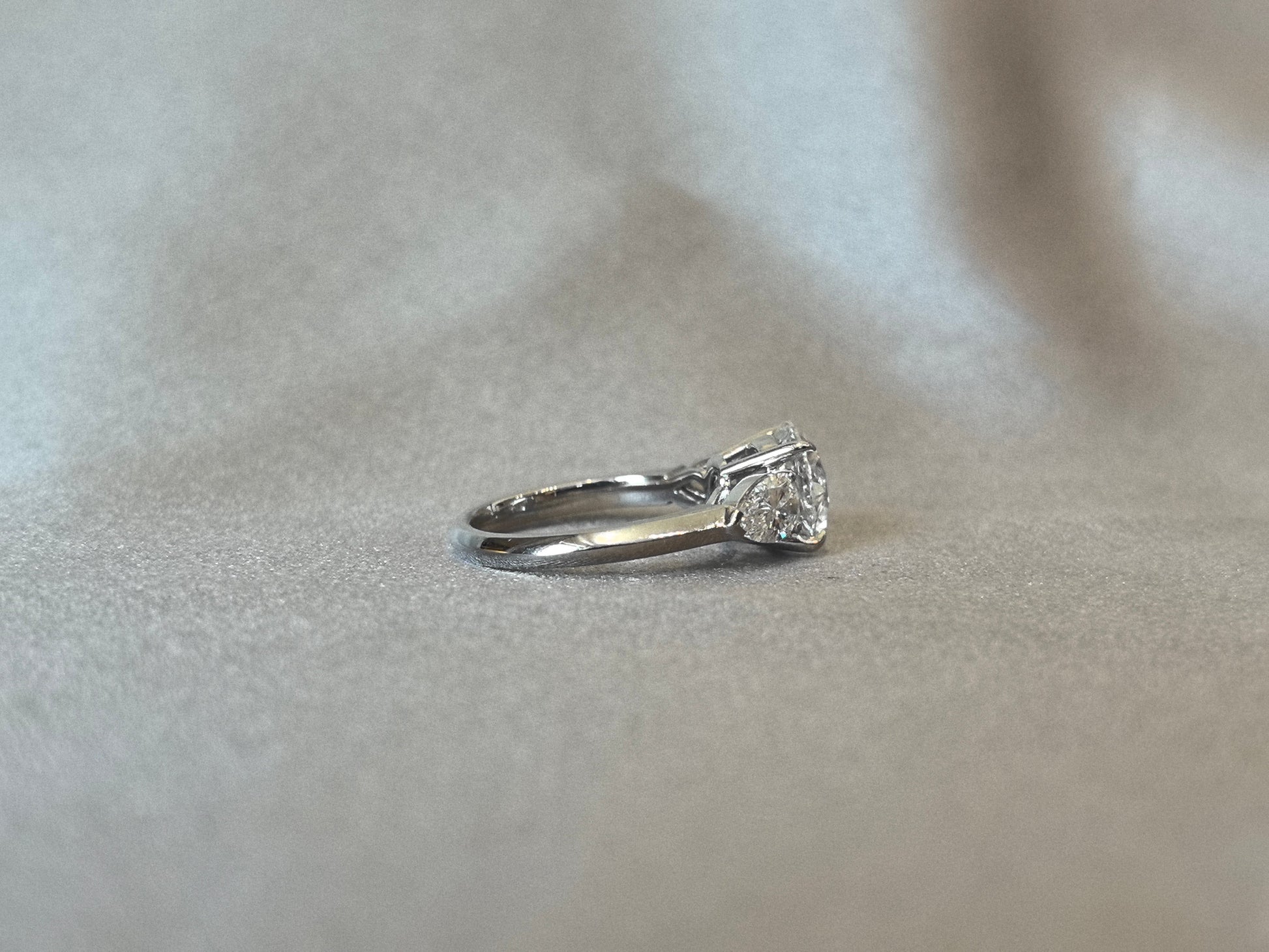 Round-Center Trilogy Ring - Pear Sidestones - Timeless Classic