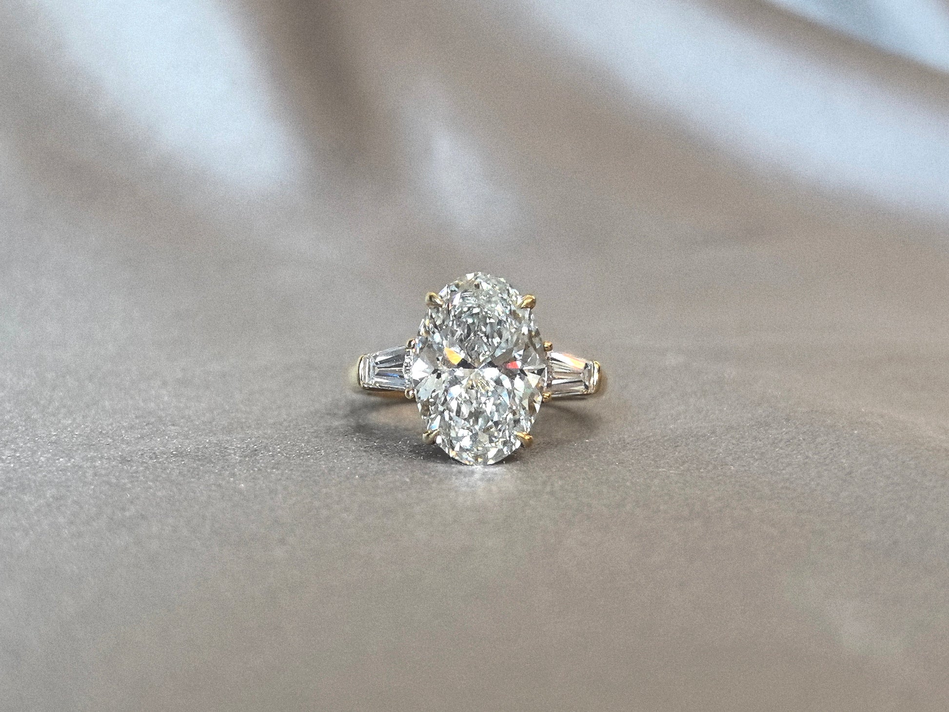 Oval Center Trilogy Ring - Baguette Sidestones - Architectural Elegance