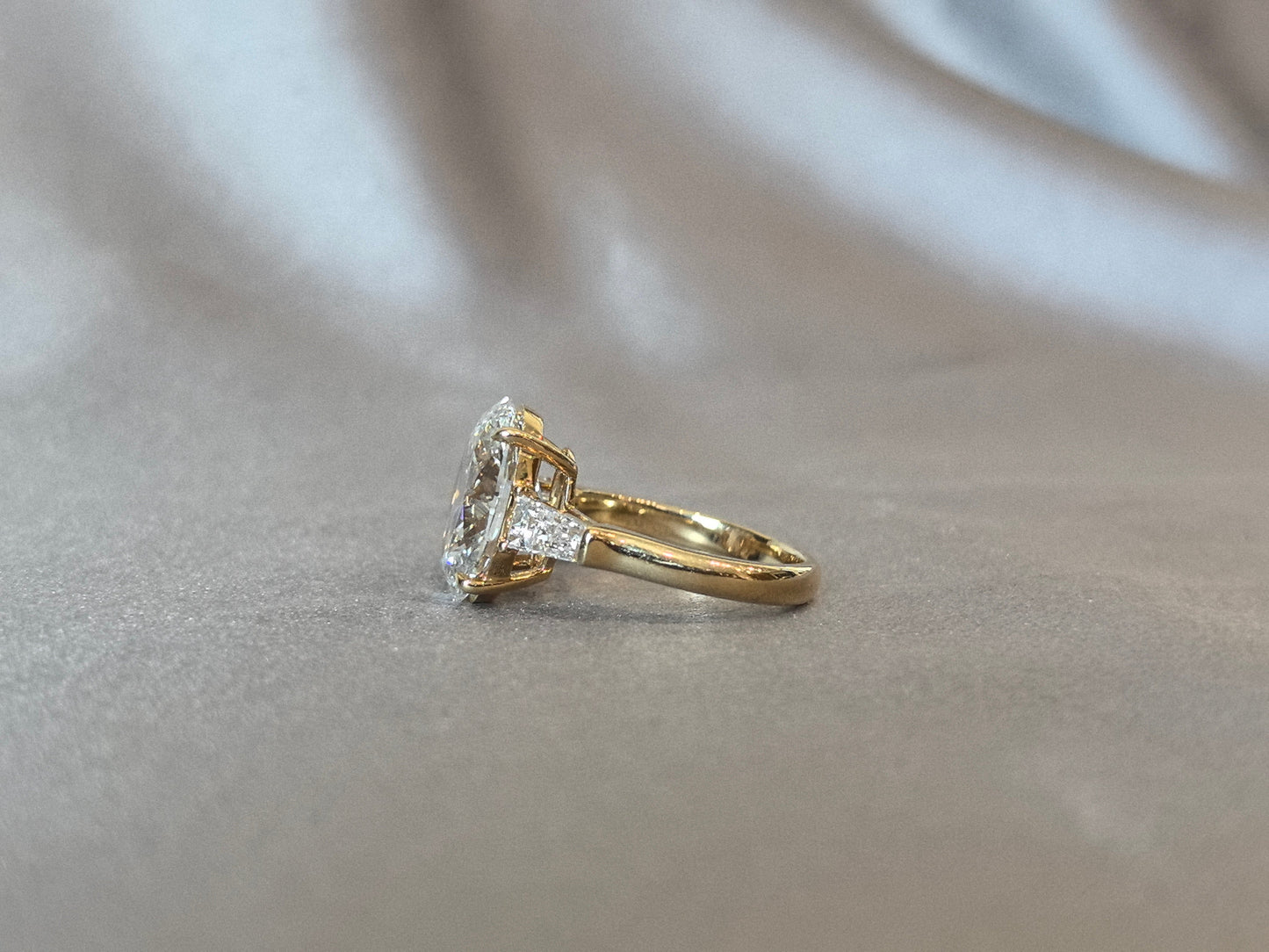 Oval Center Trilogy Ring - Baguette Sidestones - Architectural Elegance