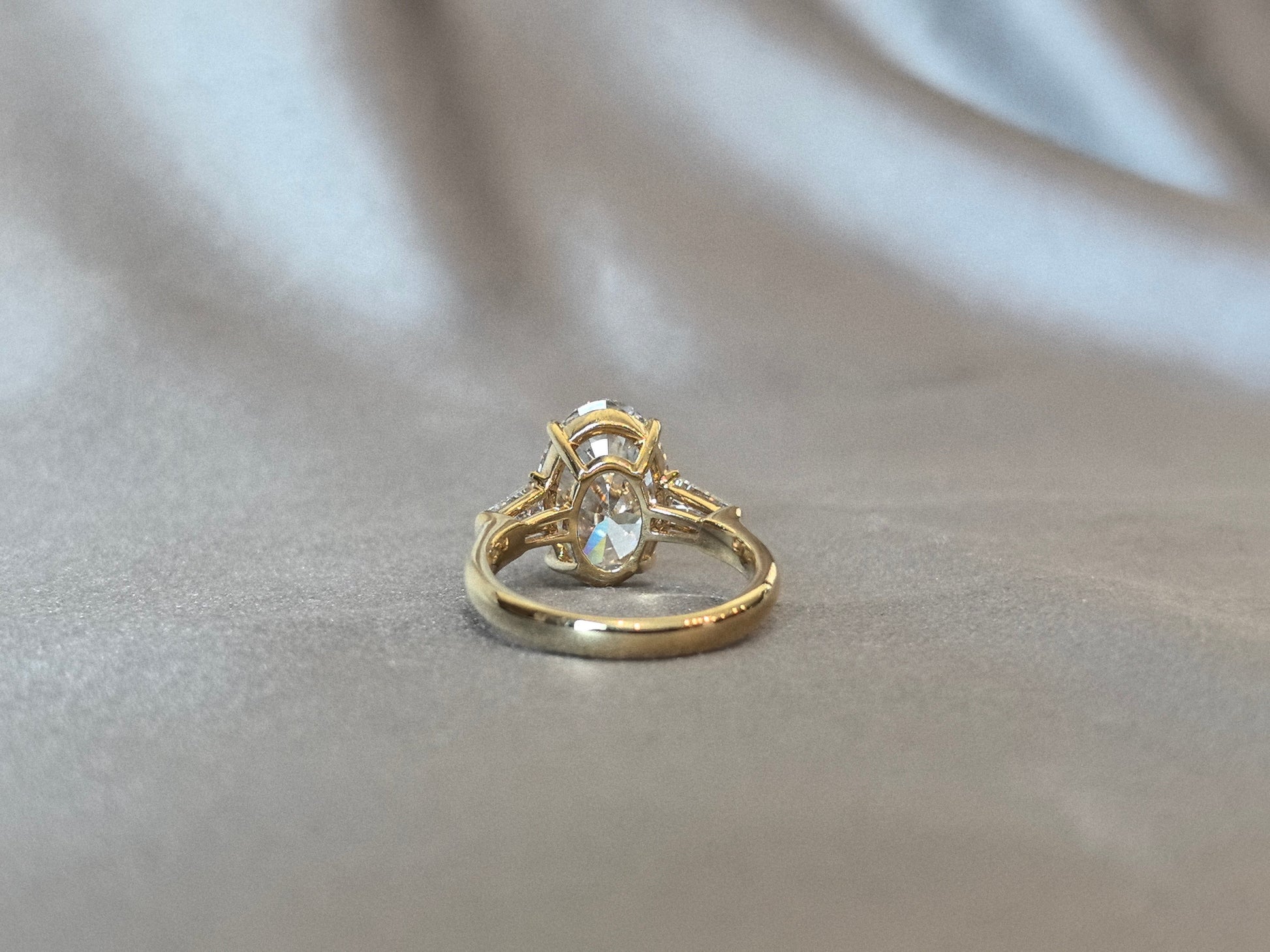 Oval Center Trilogy Ring - Baguette Sidestones - Architectural Elegance