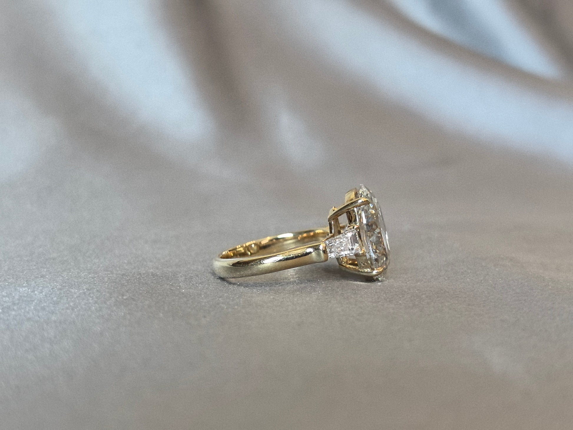 Oval Center Trilogy Ring - Baguette Sidestones - Architectural Elegance
