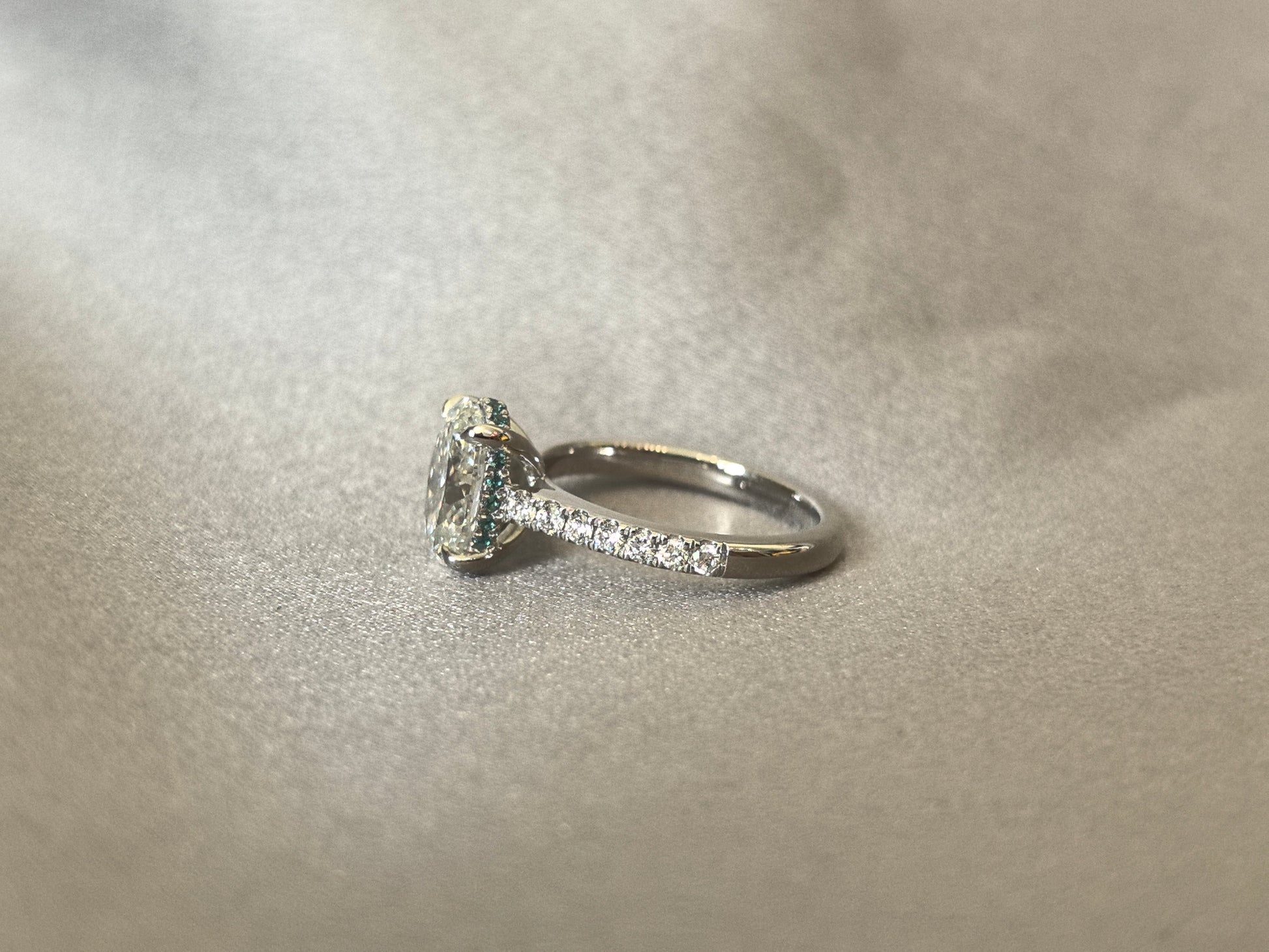 Oval Cut Half Eternity Ring Ring - Four Prong Solitaire Setting - Hidden Green Halo
