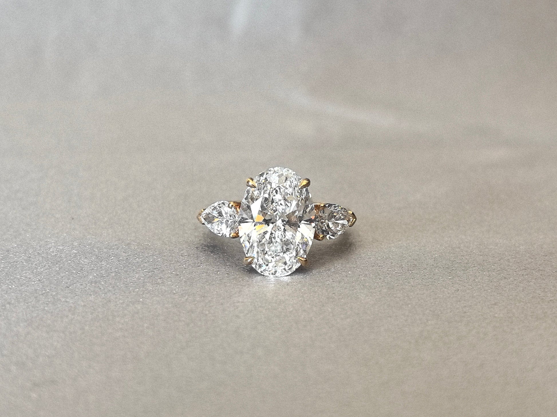 Oval Center Trilogy Ring - Pear Sidestones - Fluid Elegance