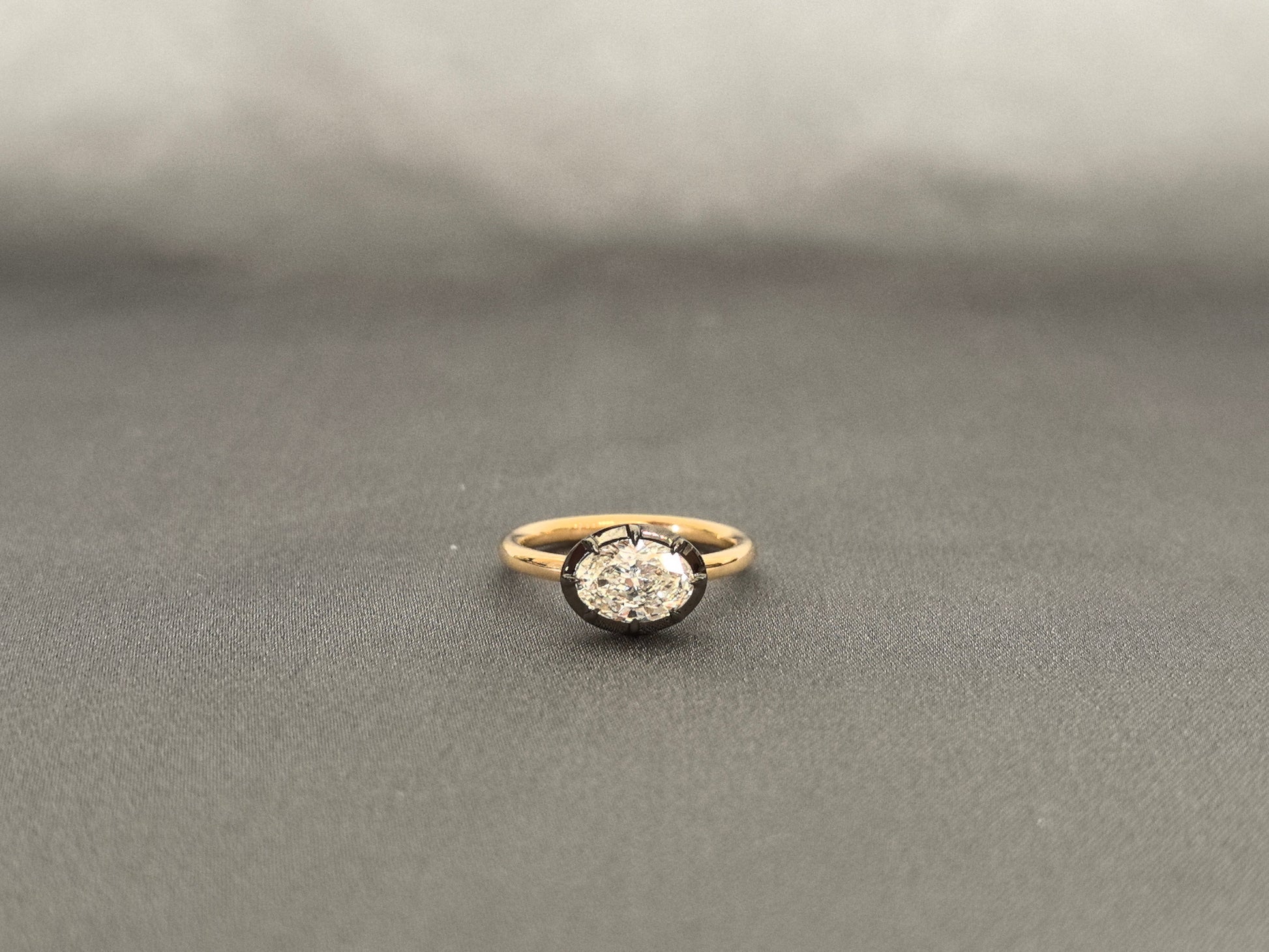 Oval Cut Hidden Halo Ring - Black Enamel Bezel Setting - Modern East-West Setting