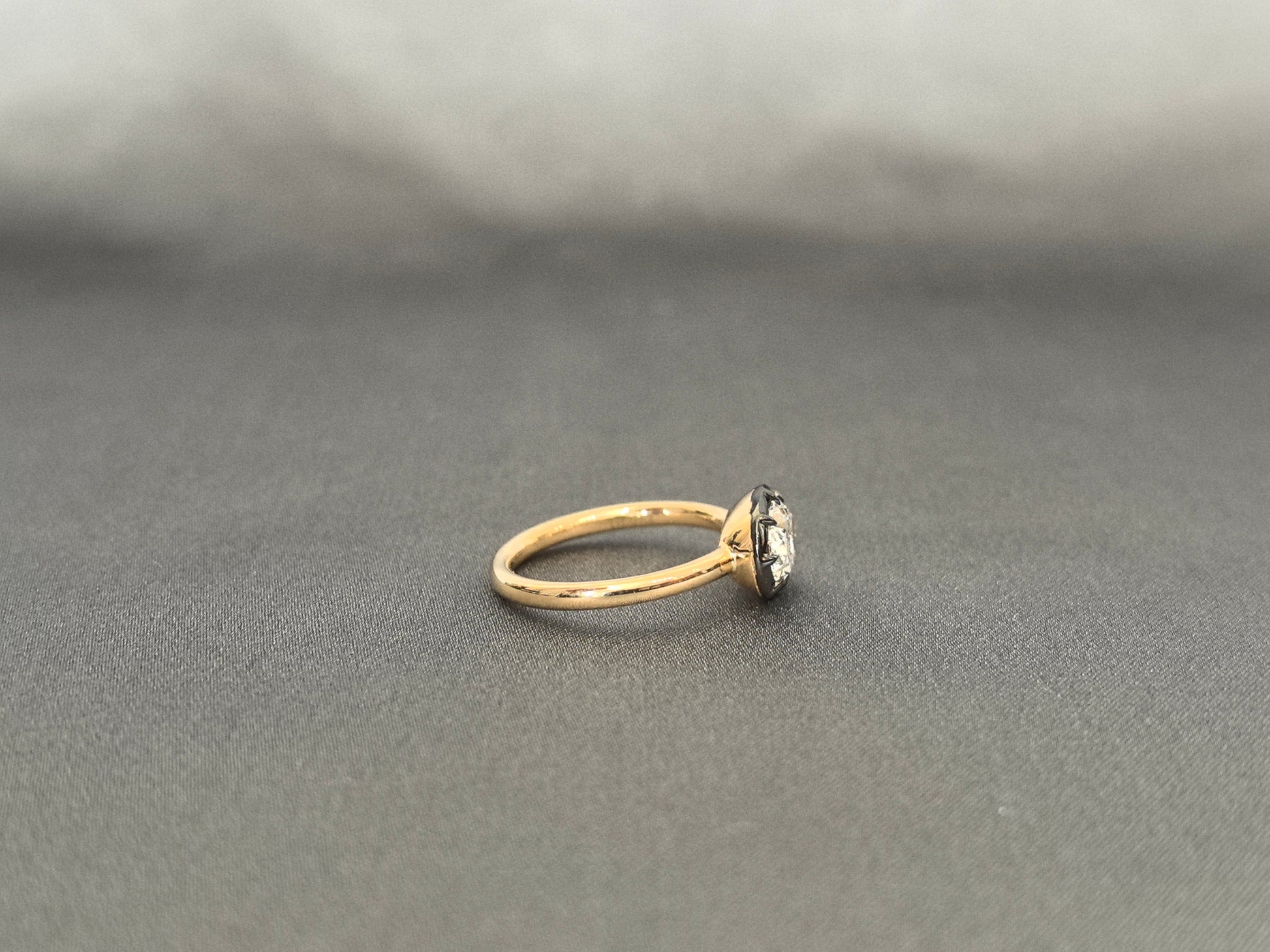 Oval Cut Hidden Halo Ring - Black Enamel Bezel Setting - Modern East-West Setting