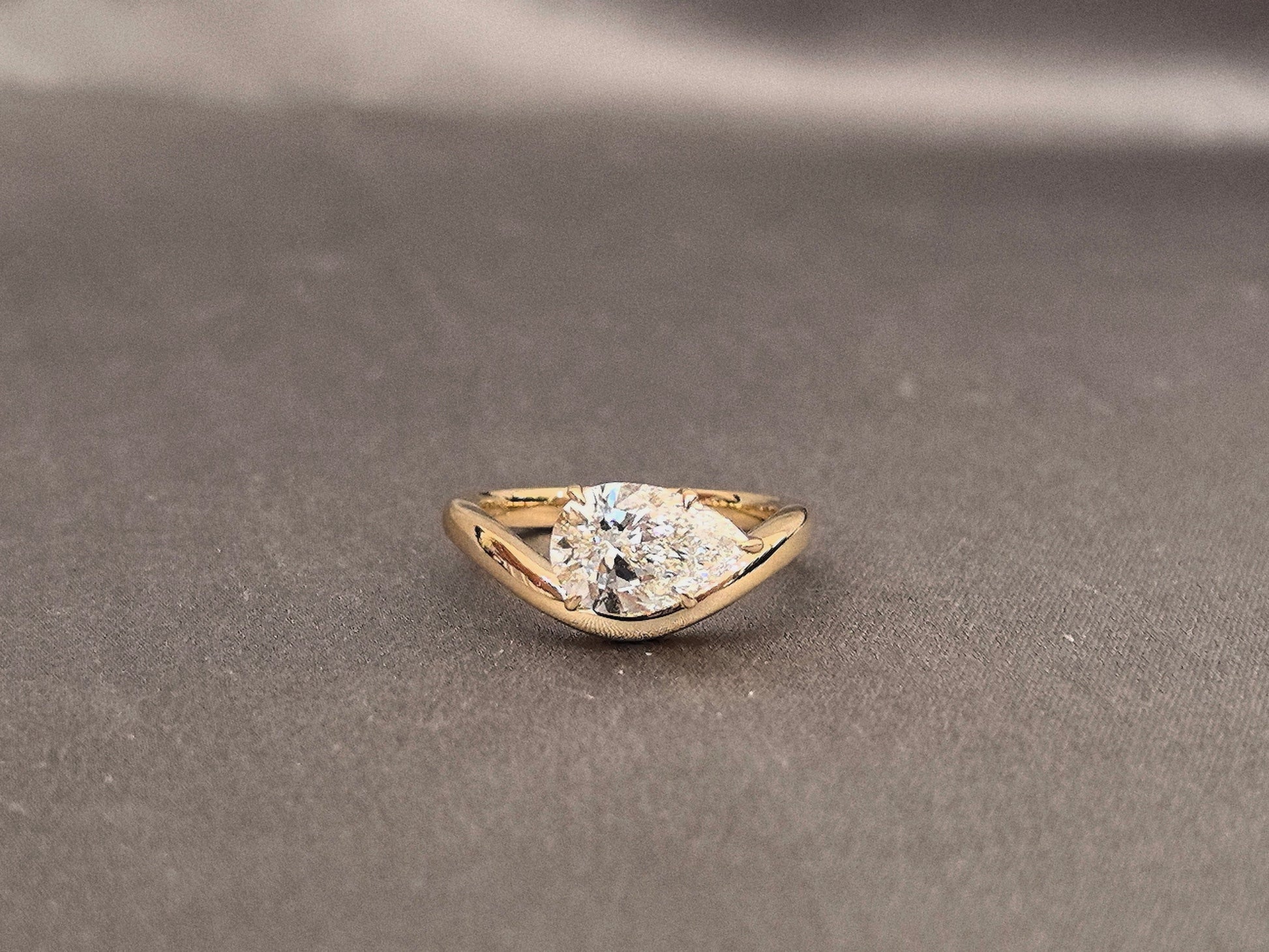 Pear Cut Solitaire Ring - V-Shape Setting - Yellow Gold Bypass Band