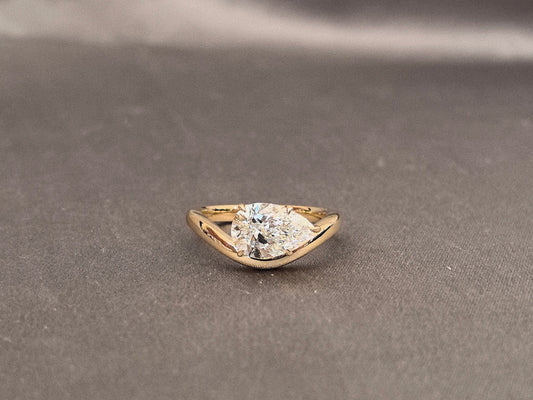 Pear Cut Solitaire Ring - V-Shape Setting - Yellow Gold Bypass Band