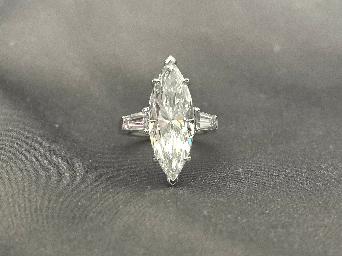 Marquise-Center Trilogy Ring - Baguette Sidestones - Architectural Elegance