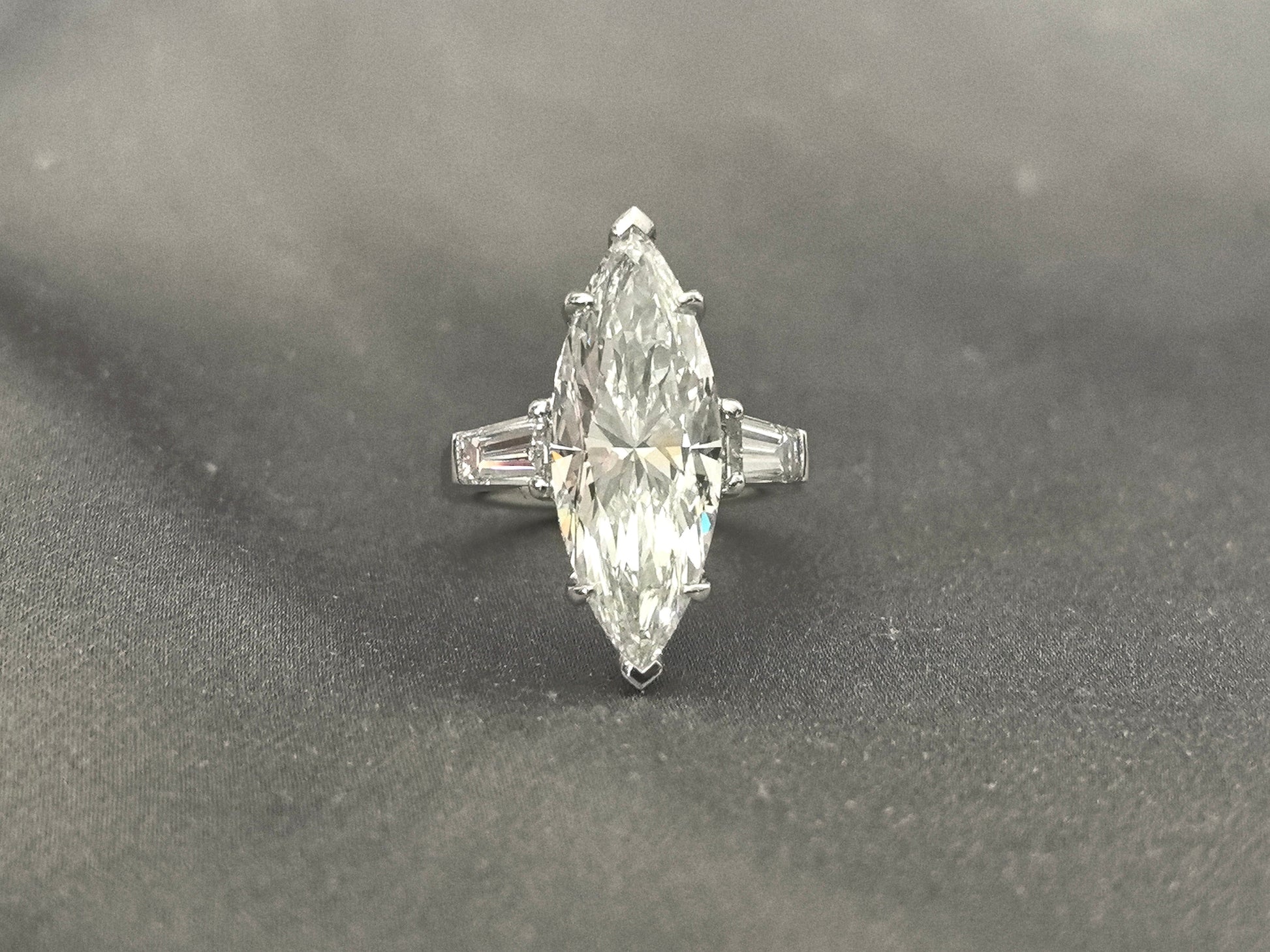 Marquise-Center Trilogy Ring - Baguette Sidestones - Architectural Elegance