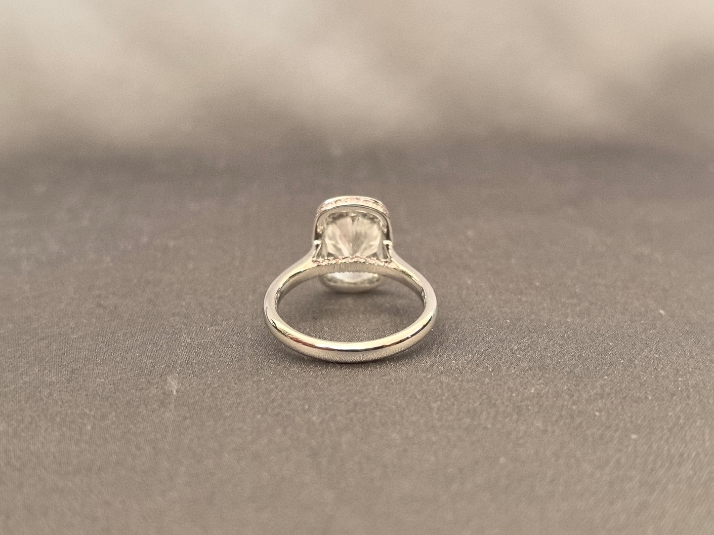 Long Cushion Cut Diamond Ring with a Pink Surprise
