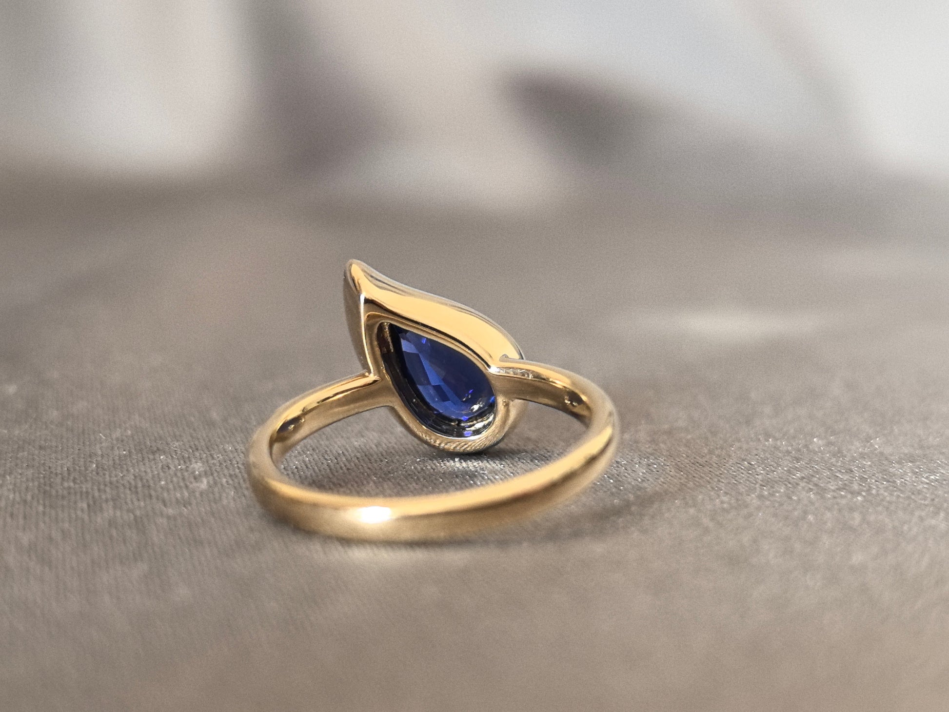 Pear-shaped Lab-Grown Diamond Pinky Ring - Blue Gemstone - Full Halo Setting