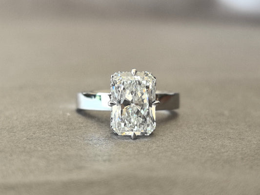 Brilliant Cut Ring - Wide Band - Four-Prong Setting in North, South, East, and West Directions