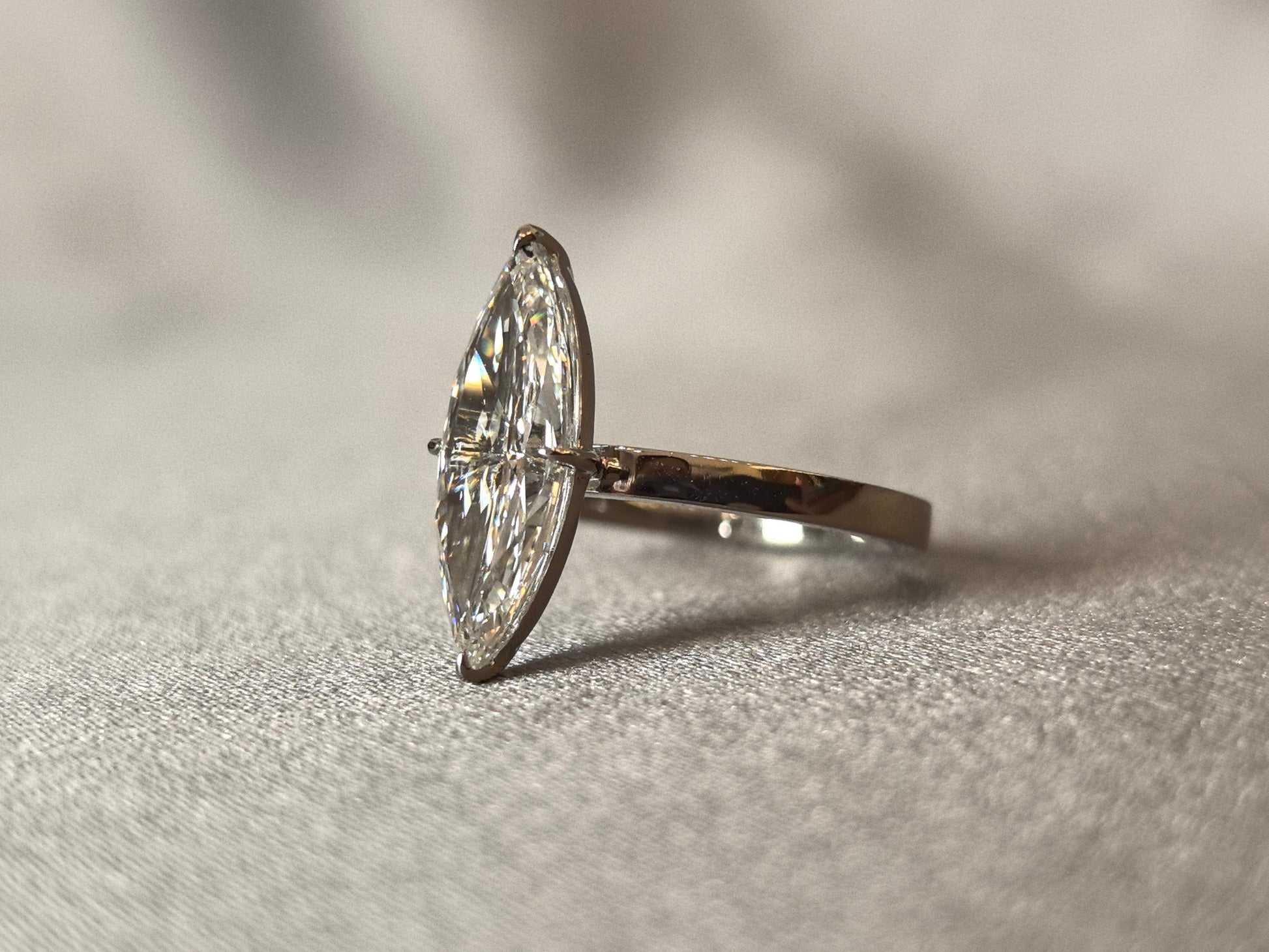 Marquise-cut lab diamond solitaire ring - 2-prong set - Smooth snag-free band surface