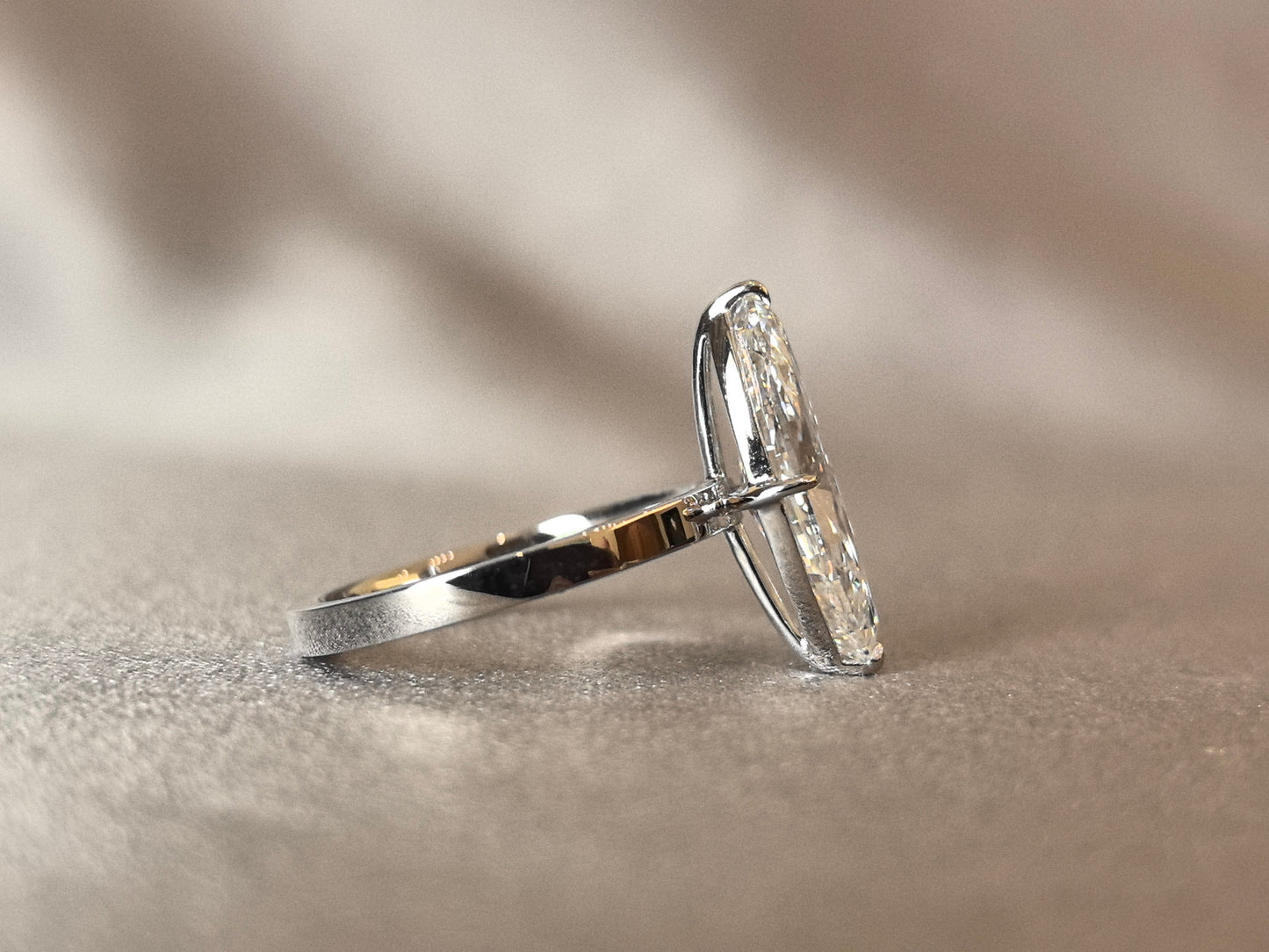 Marquise-cut lab diamond solitaire ring - 2-prong set - Smooth snag-free band surface