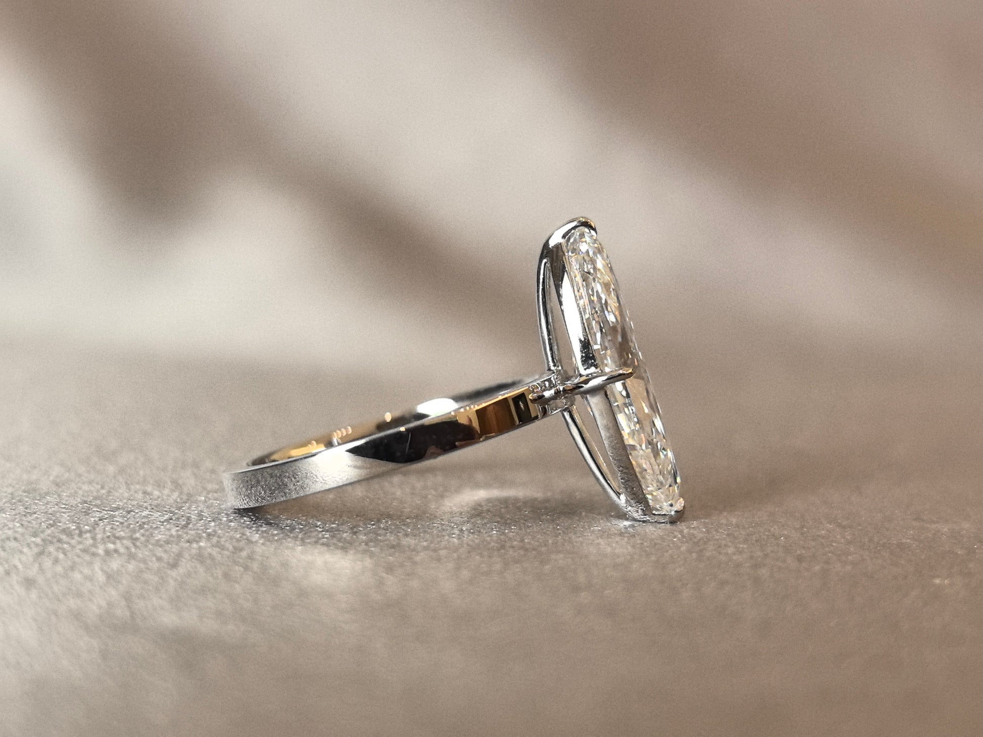 Marquise-cut lab diamond solitaire ring - 2-prong set - Smooth snag-free band surface