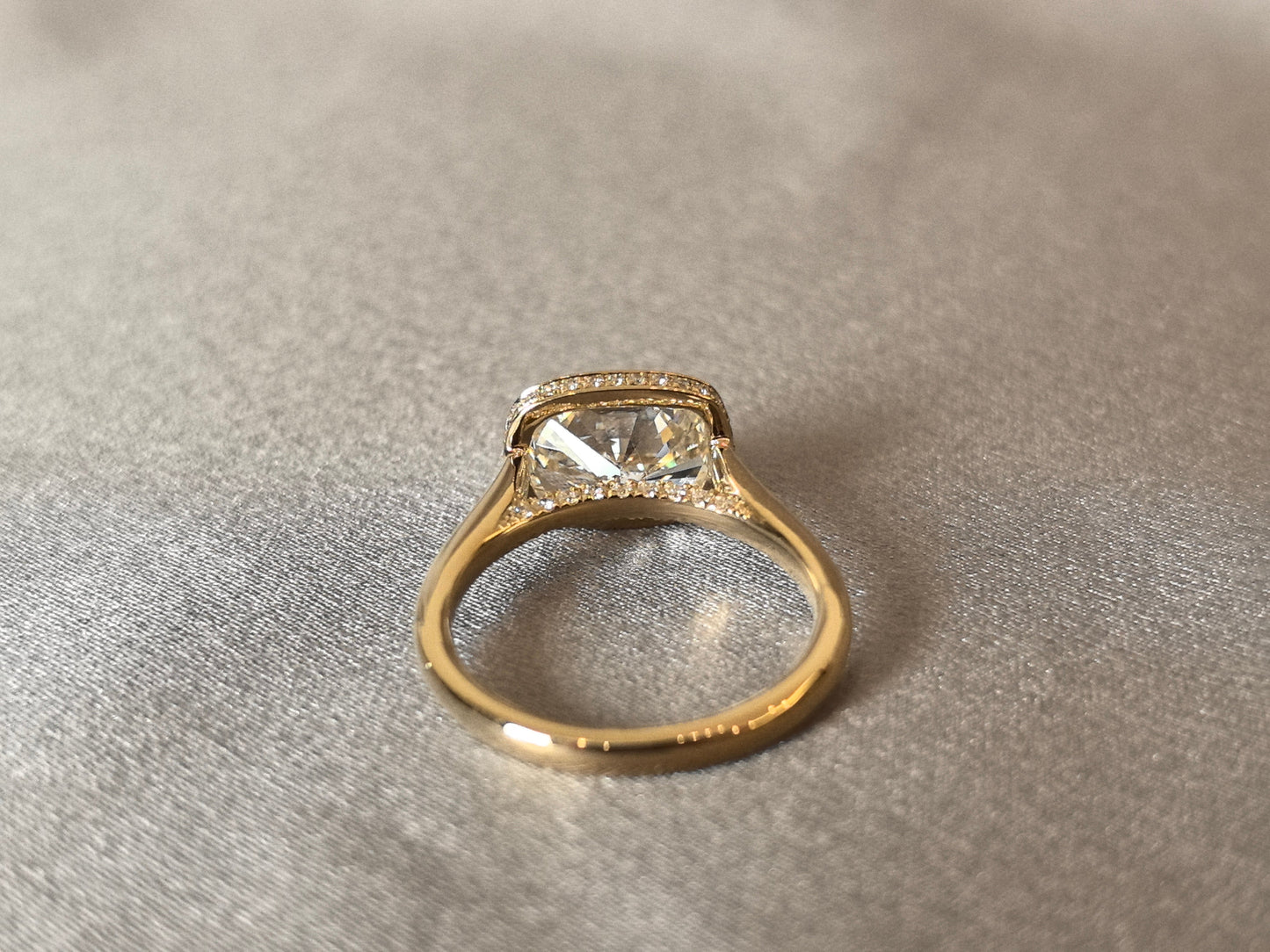 5-carat cushion setting, 14K gold, bezel-set, horizontal design