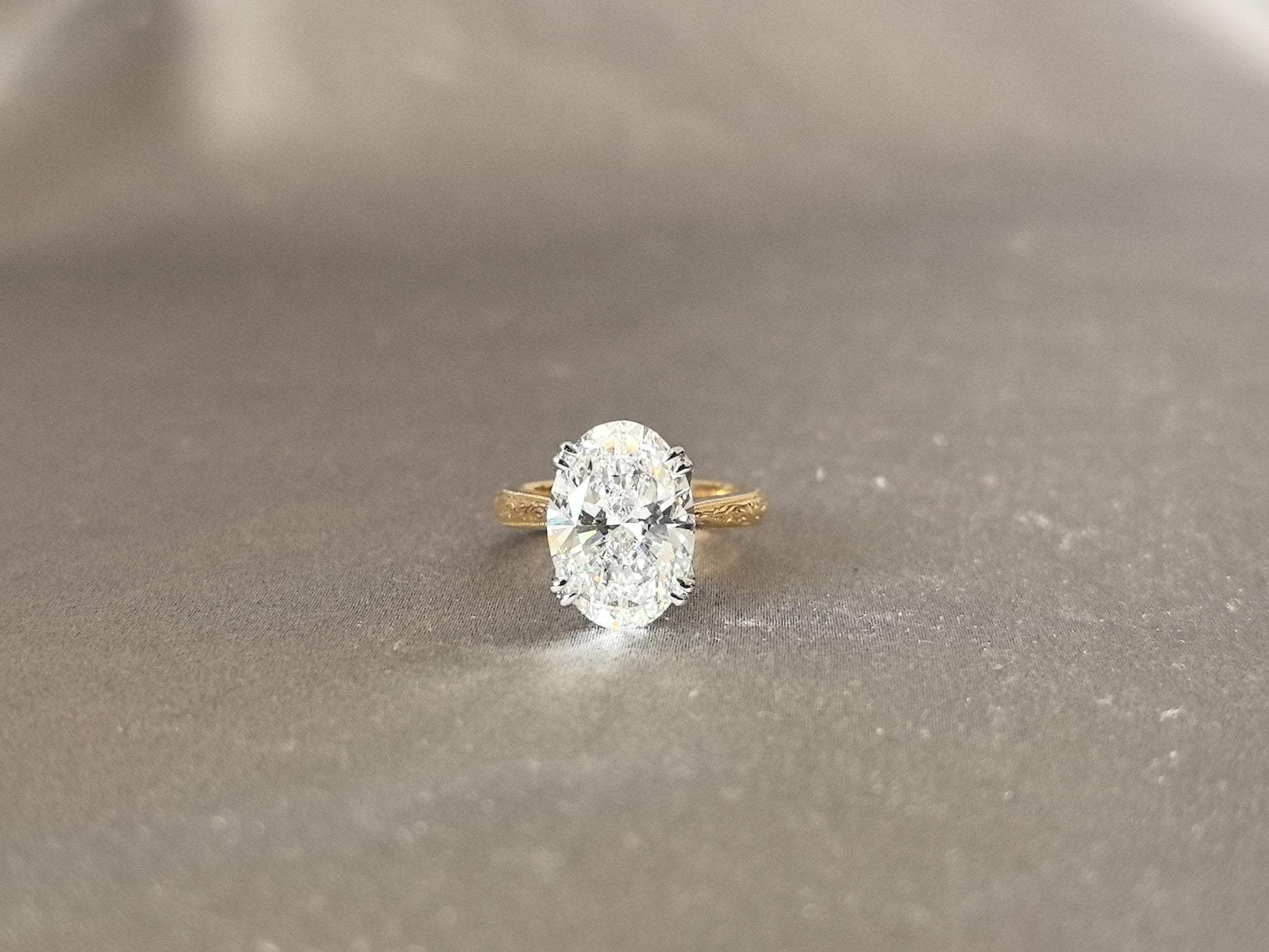 Oval Diamond - Four Prong Setting - Round Shank with Fine Engraving