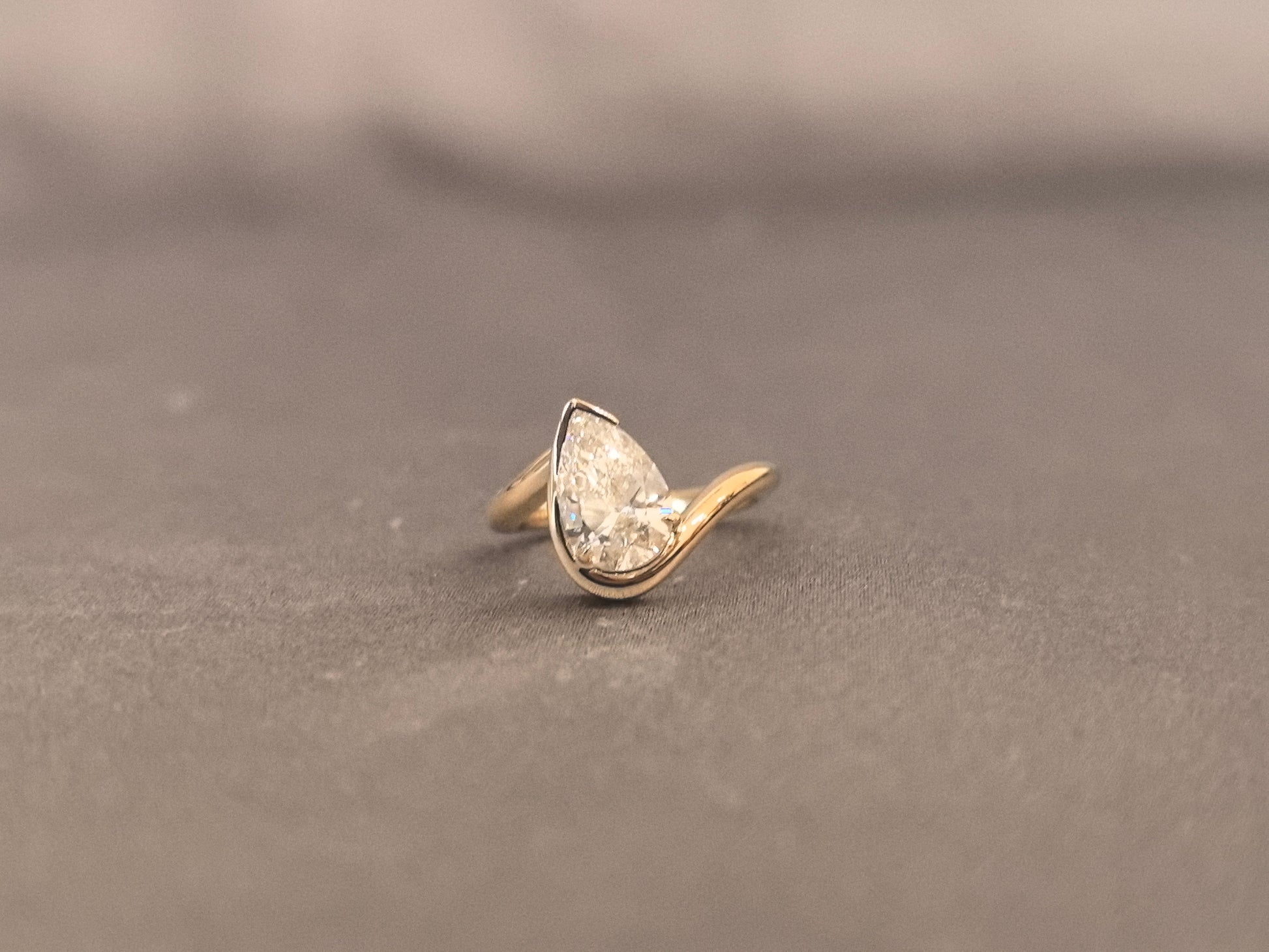 Pear Shape Diamond Ring - Bezel Setting - Curved Shank