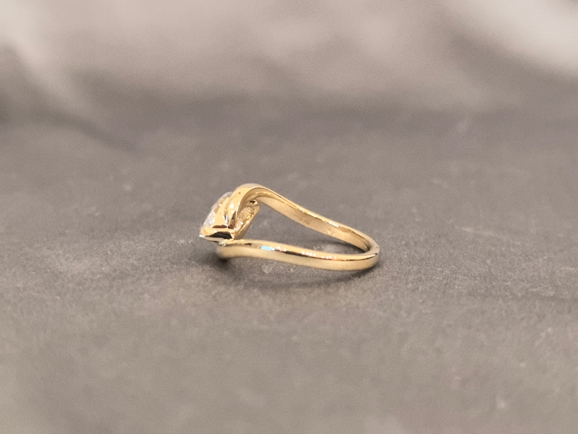 Marquise Cut Bezel Solitaire Ring - Twisted Bypass Band - Yellow Gold Bezel Setting