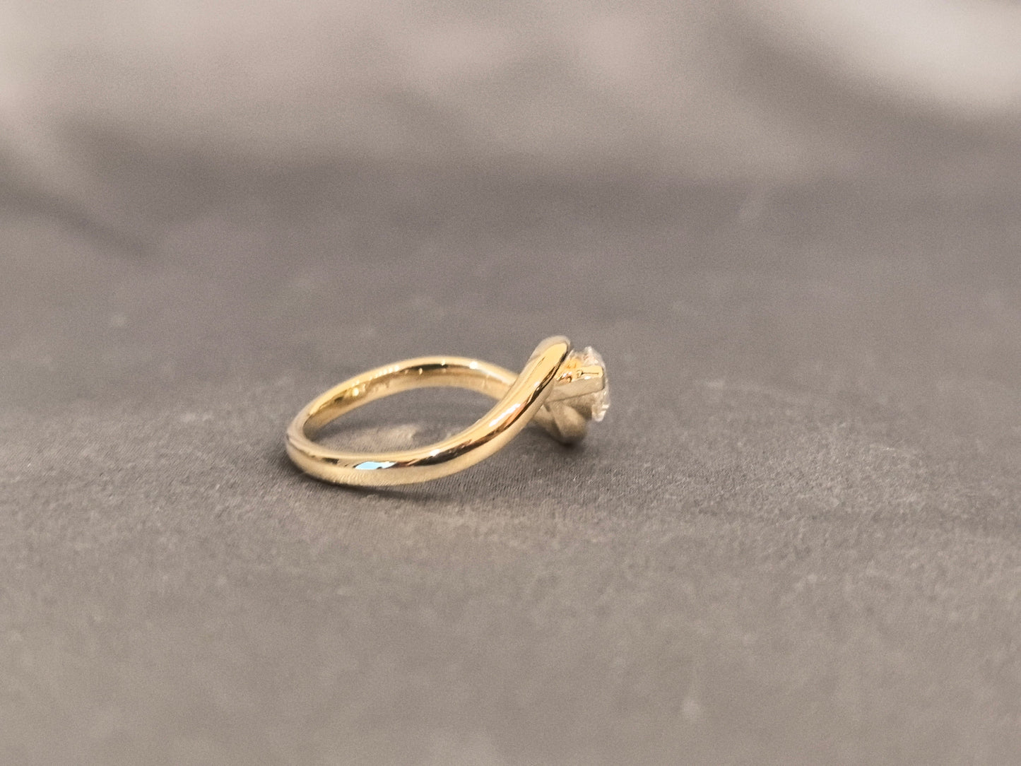 Marquise Cut Bezel Solitaire Ring - Twisted Bypass Band - Yellow Gold Bezel Setting