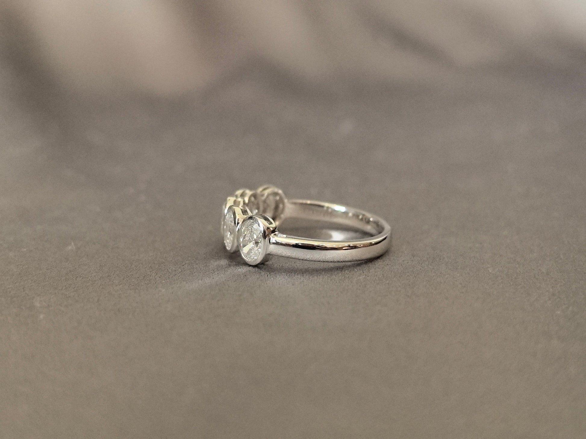 Oval-cut lab diamond half eternity ring - Bezel-set - Five-stone ring