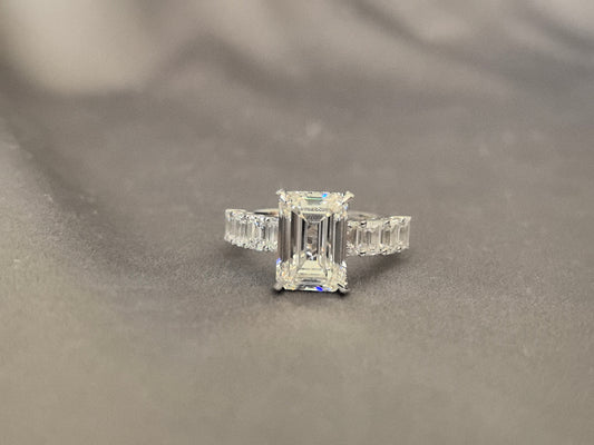 Emerald-cut lab diamond engagement ring - Open gallery design for maximum light flow - Baguette and round diamond accent