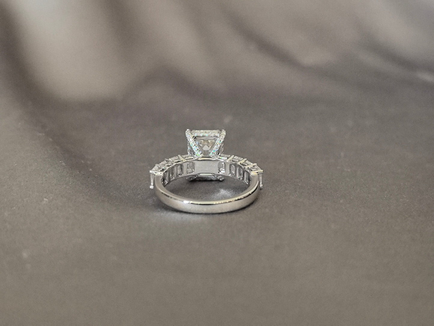 Emerald-cut lab diamond engagement ring - Open gallery design for maximum light flow - Baguette and round diamond accent