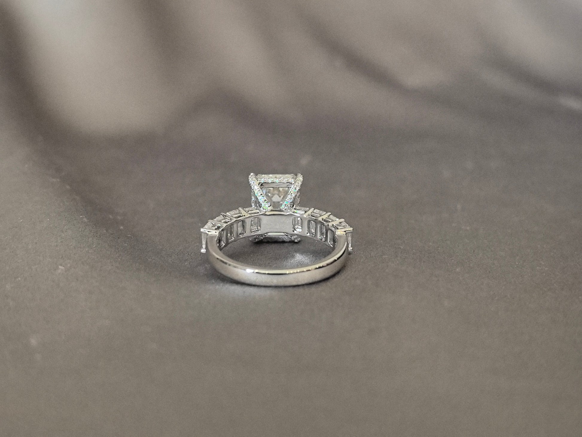 Emerald-cut lab diamond engagement ring - Open gallery design for maximum light flow - Baguette and round diamond accent