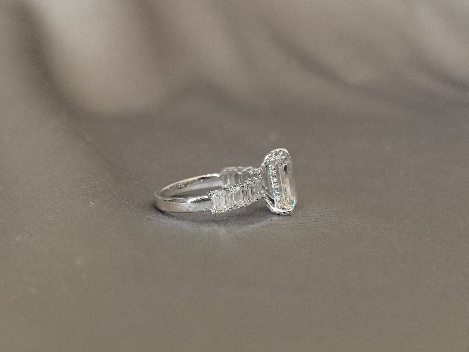Emerald-cut lab diamond engagement ring - Open gallery design for maximum light flow - Baguette and round diamond accent